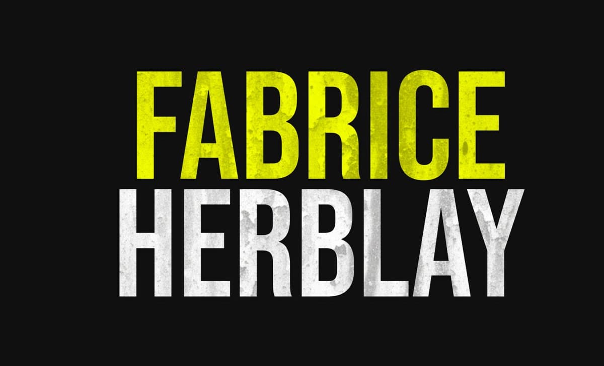 Logotype Fabrice Herblay, jaune et blanc sur noir